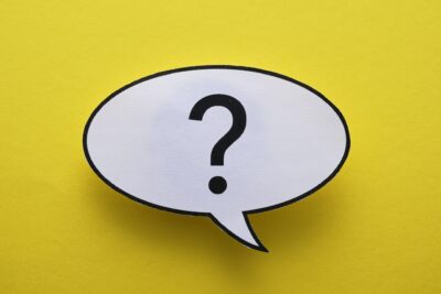 Oval speech or thought bubble with question mark