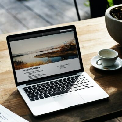 A laptop on a table looking at a fake rental listing. 