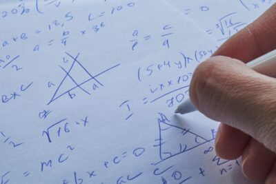 sheet of paper filled with timeshare calculations.